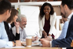 Business people with different ethnicities and age gathered together
