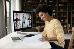 A young African-American happily reviewing documents