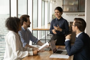 Indian businesswoman leading a corporate meeting