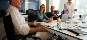 People talking and laughing, fostering diversity and inclusion