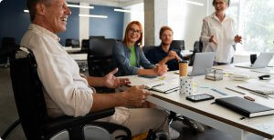 People talking and laughing, fostering diversity and inclusion