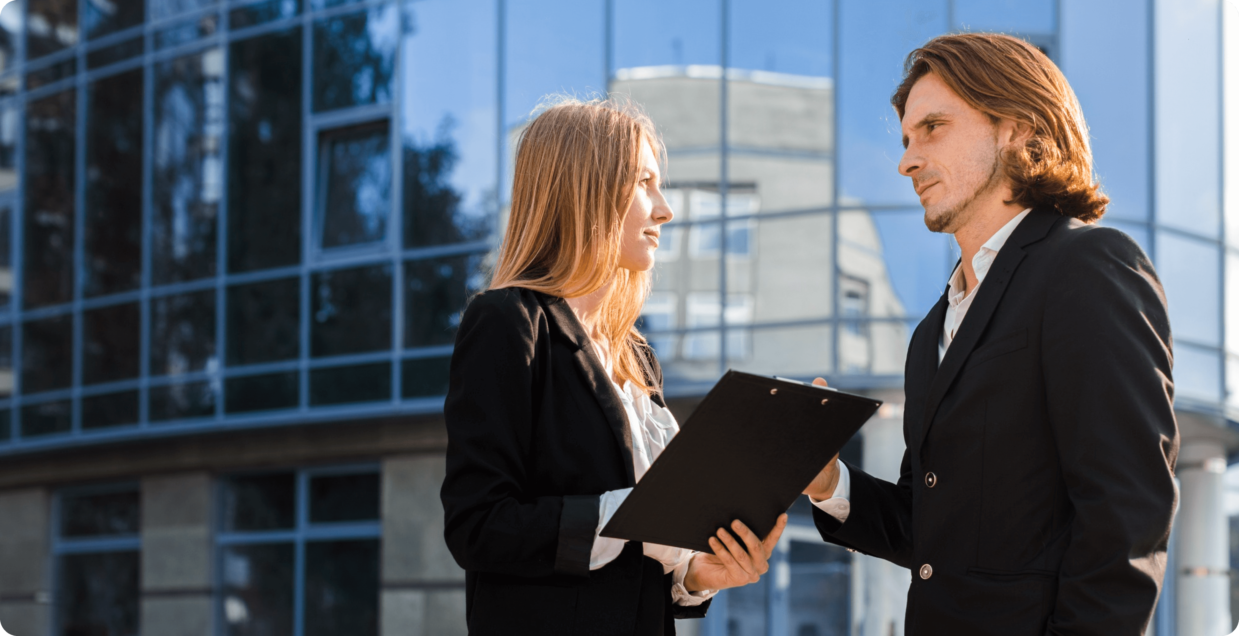 A man and women checking file - Foster diversity and inclusion in government - Careers In Government