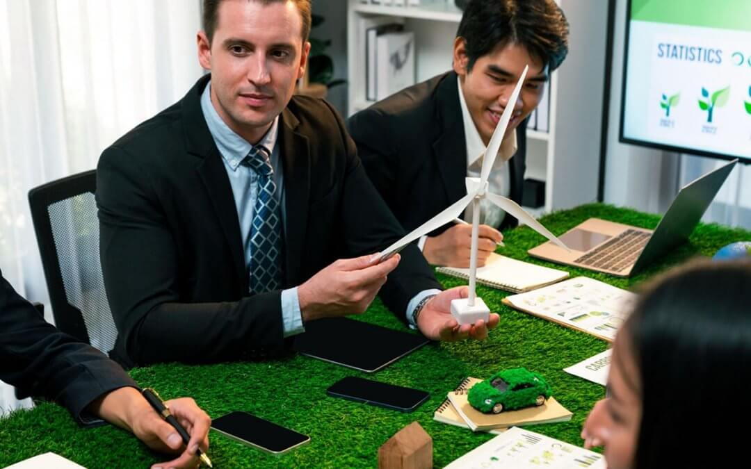 Employees in a table discussing the importance of wind engine