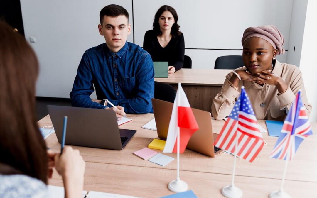 A team with different ethnicities in office room discussing