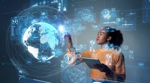 A woman stands holding a tablet, interacting with a digital interface displaying a holographic Earth and various technological icons. She appears to be analyzing or manipulating data powered by AI in a high-tech environment.