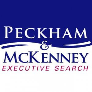 Peckham & McKenney Executive Search logo with white and blue background; "Peckham & McKenney" in large white and blue letters, "Executive Search" in smaller red letters below.