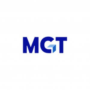The image shows the letters "MGT" in bold blue font on a white background, with the horizontal bar of the "G" stylized as a blue 3D geometric shape.