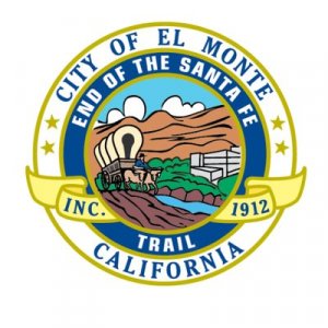 Seal of El Monte, California, featuring a covered wagon on the Santa Fe Trail, mountains, blue sky, buildings, and text: "City of El Monte, End of the Santa Fe Trail, Inc. 1912, California.