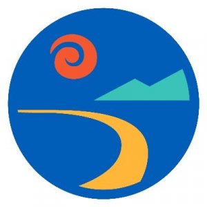 Stylized logo of a winding yellow path leading to green mountains under a red spiral sun, all within a blue circle.