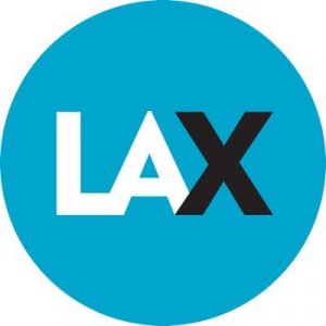 The image shows the abbreviation "LAX" with "LA" in white and "X" in black, all in bold letters centered on a bright blue circular background.