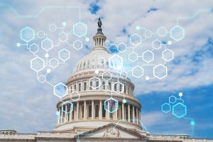 The U.S. Capitol building with a digital overlay of hexagons and connected lines, symbolizing technology, innovation, or digital transformation in government careers, against a partly cloudy sky.