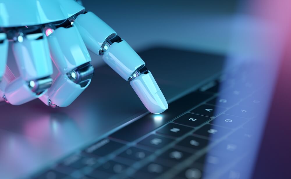 A robotic hand with metallic fingers touches the illuminated trackpad of a laptop keyboard, symbolizing artificial intelligence, technology integration, and the evolving future of government workers. A robotic hand with metallic fingers touches the illuminated trackpad of a laptop keyboard, symbolizing artificial intelligence, technology integration, and the evolving future of government workers.