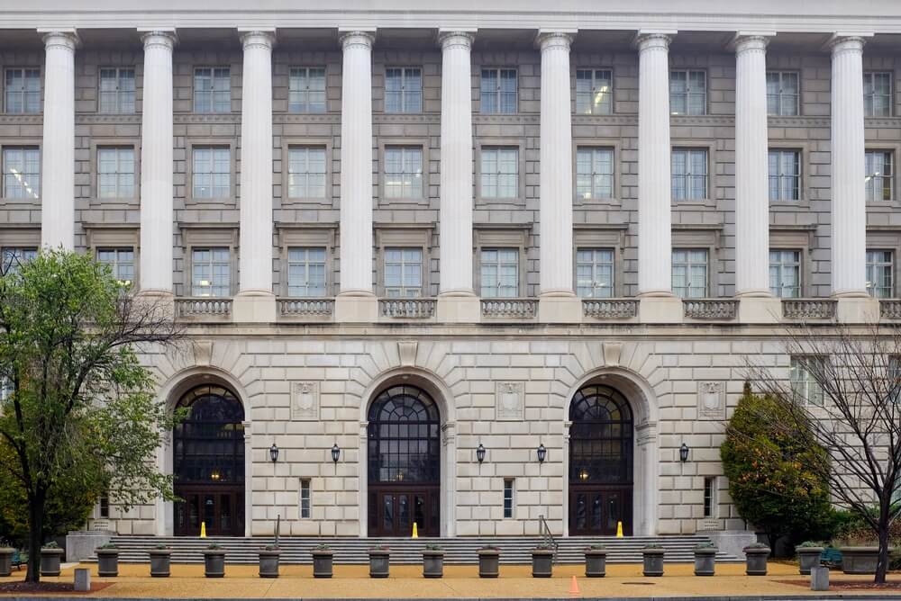 Internal,Revenue,Service,(irs),Building,In,Washington,Dc,United,States The image shows the neoclassical facade of a federal government building with large columns and the words "The Treasury Department" engraved above them.